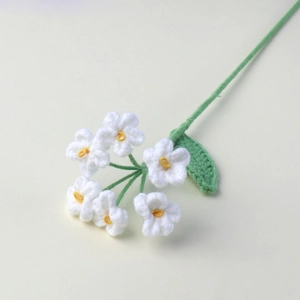 Handmade crochet forget-me-not flower with white petals and yellow centers for gift