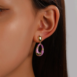 Elegant gold oval twist earrings with purple marble texture for a vintage aesthetic look