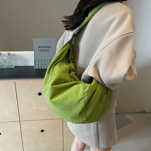 Large bright green nylon dumpling crossbody bag for casual daily use and students