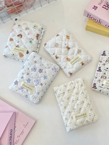 Quilted cotton passport covers with cute bear and floral patterns for travel storage