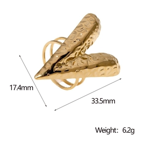 Macro detail of gold hammered texture ring with dimensions 33.5mm by 17.4mm