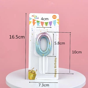 Blue-purple gradient number 0 birthday candle with gold foil in blister card packaging