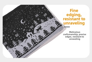Detail of winter knit scarf showing delicate edging and snowflake reindeer patterns