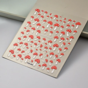 Detail of 5D embossed red mushroom nail stickers with 3D texture on card paper