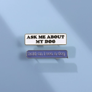 Enamel dog-themed brooches with phrases Ask Me About My Dog and Hold On I See A Dog