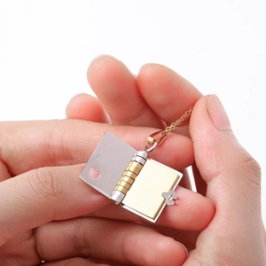 Titanium steel locket necklace with openable book pendant and hollow heart in silver and gold
