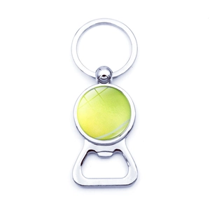 Detail of silver metal keychain bottle opener with a yellow-green tennis ball pattern