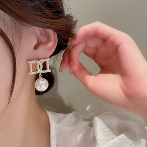 Elegant gold letter D earrings with crystal pavé and large pearl drops for women