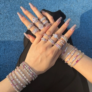 Macro shot of S925 silver rings and tennis bracelets with colorful zircon gemstones