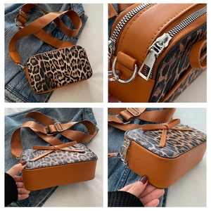 Detailed views of brown leopard print crossbody bag with bow accent and wide strap