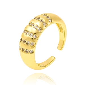 Macro detail of gold-plated 925 silver ring featuring sparkling gemstone rows