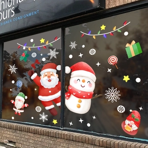 Christmas window decals with Santa, snowman, and gnomes for festive store glass decoration