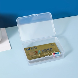 Transparent plastic card storage box with a secure flip-top lid and rounded edges