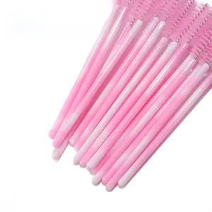 Detailed view of pink gradient disposable eyelash brushes with spiral nylon bristles