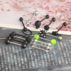 Detail view of mixed stainless steel and acrylic tongue rings in various colors and styles