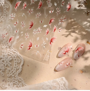 Detail of TL-455 nail art stickers with red butterflies, flowers and 3D pearl texture