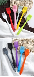 Flat lay of colorful one-piece silicone pastry brushes for baking and oil basting