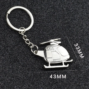 Detailed size view of silver helicopter keychain showing 43MM length and 33MM height