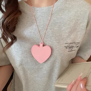 Chic pink leather heart-shaped pendant necklace with a fine litchi grain texture