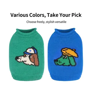 Knitted winter dog sweater with cartoon puppy illustration in green and blue colors