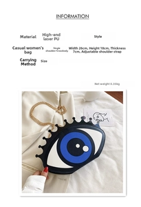Detail of laser PU leather round bag with big eyes design and golden chain strap