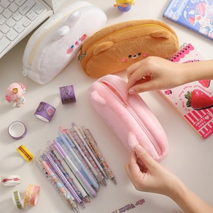 Detailed view of the zipper opening on a cute plush pink bear pencil case for students