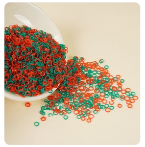 Bulk red and green elastic PVC rings for DIY food models shown in a white bowl