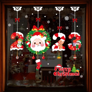 Detail of Christmas window clings with Santa, snowman and Merry Christmas text