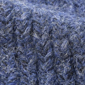 Deep blue and white mixed knit wool beanie with plush texture and thick ribbed pattern