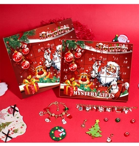 Close-up of Christmas advent calendar boxes with charms and beads for DIY bracelet