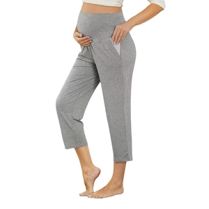 High-waisted grey maternity leggings with pockets and elastic belly support for comfort