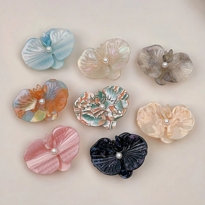 Elegant acetate orchid flower hair clips set with pearls in eight pastel colors