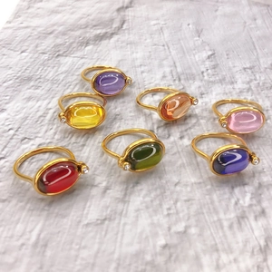 18K gold plated rings set featuring oval colorful zircons and side diamond accents