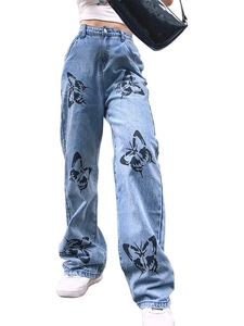 Slim fit light blue denim jeans with black butterfly print for women shown on model