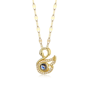 Golden swan pendant necklace with projection stone and diamond accents on a fine chain
