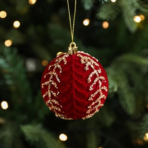 8cm burgundy flocked Christmas ball with gold glitter patterns on a festive tree background