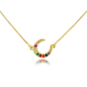 Golden moon pendant necklace featuring rainbow zircons on a delicate chain with reflection