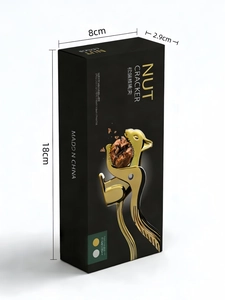 Detail view of squirrel nut cracker in premium black gift packaging with dimensions