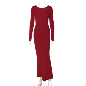 Detail view of red backless slim-fit maxi dress featuring elegant pleated textures