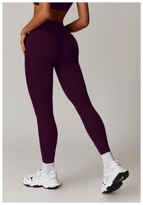 Detail view of high waist plum purple leggings with scrunch butt lift design for fitness