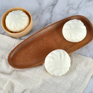 Set of three realistic slow-rebound PU steamed buns in a bamboo steamer for stress relief