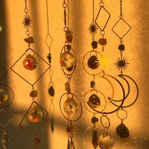 Bohemian gold crystal suncatcher wind chime set with geometric frames and rainbow prisms