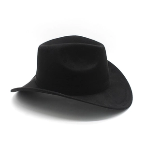 Detail of a black suede western cowboy hat with a classic wide curved brim and fedora top