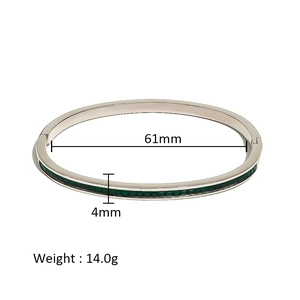 Detail view of silver metal bangle with green stones showing 61mm diameter and 4mm width