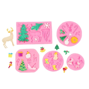 Detailed pink silicone Christmas fondant molds with reindeer and snowflake patterns