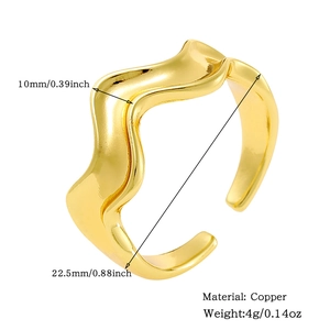 Macro detail of 18K gold plated copper wave ring with 10mm width and 4g weight specs