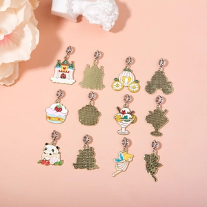 Macro detail of assorted colorful enamel panda, cake, and pumpkin car alloy charms