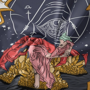 Detailed view of mystical zodiac tapestry fabric with golden crystal print and smooth texture