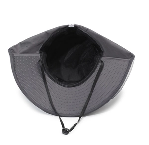 Detail of outdoor sun hat with breathable mesh lining and adjustable chin strap cord