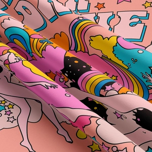 Close-up of Y2K style tapestry fabric with rainbow and retro cartoon girl print